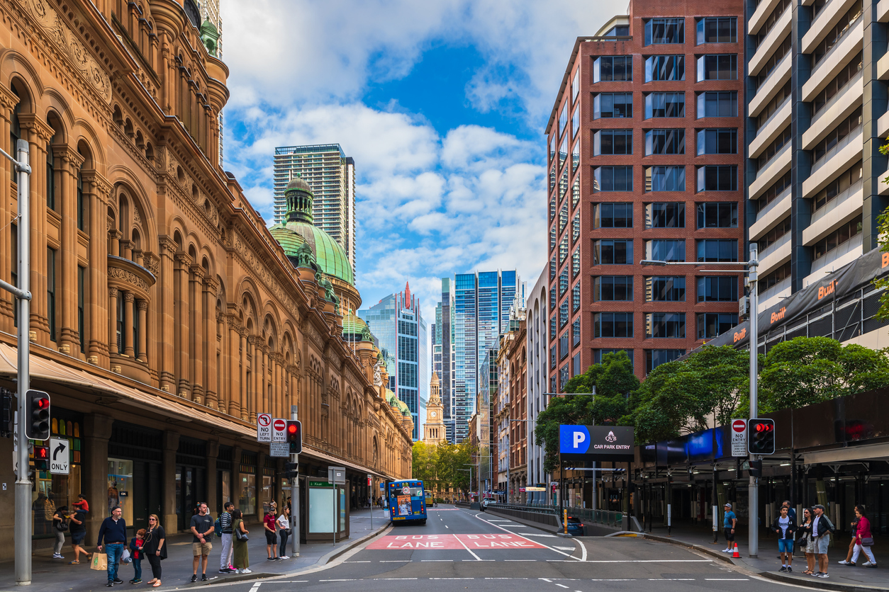 Sydney, Australia - April 16, 2022: York street viewed towards South with the Sydney Queen Victoria Building on the left and modern skyscrapers can be seen on the background on a day